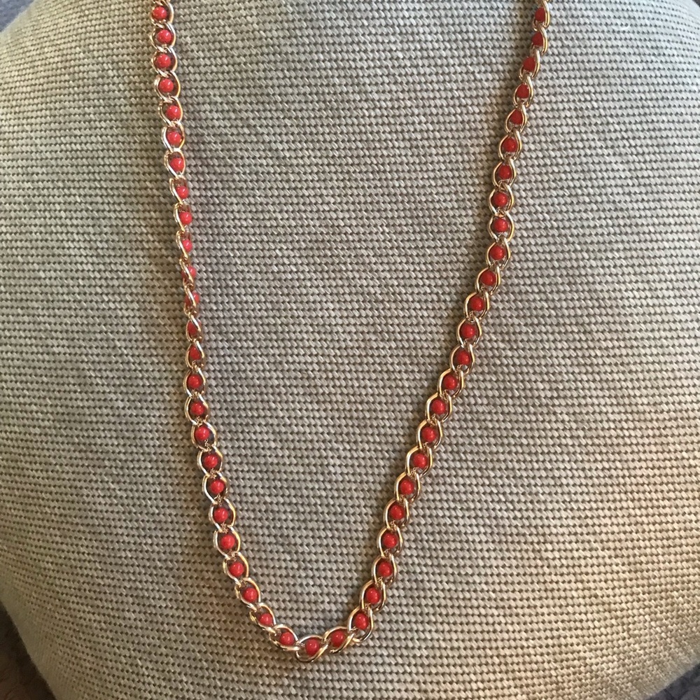 Bundle 3 for $10 34” long gold toned necklace with orange/red beads. EUC